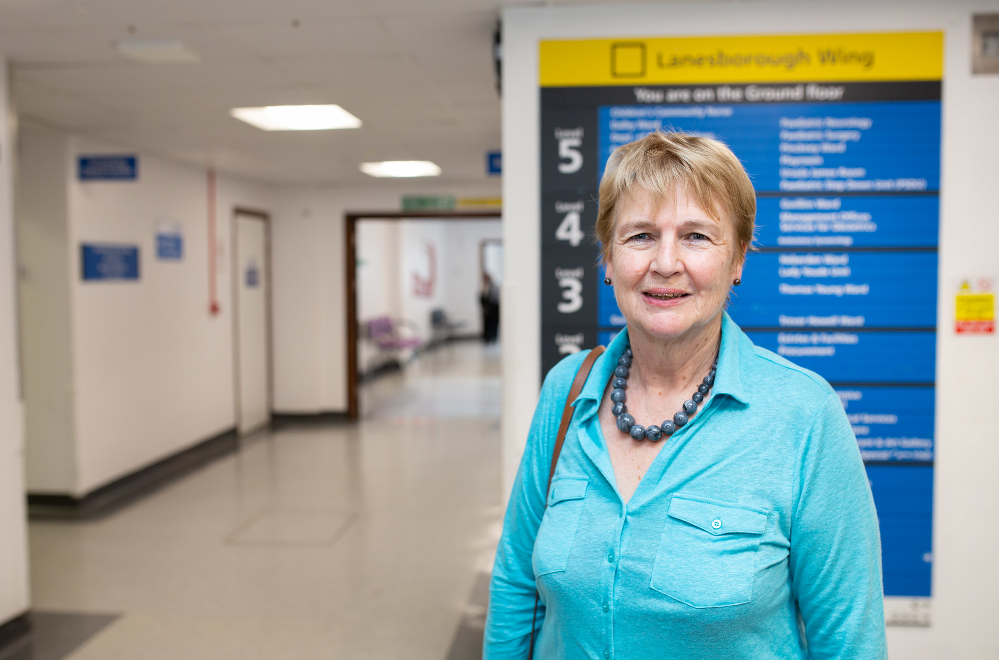 lady smiling at a hospital